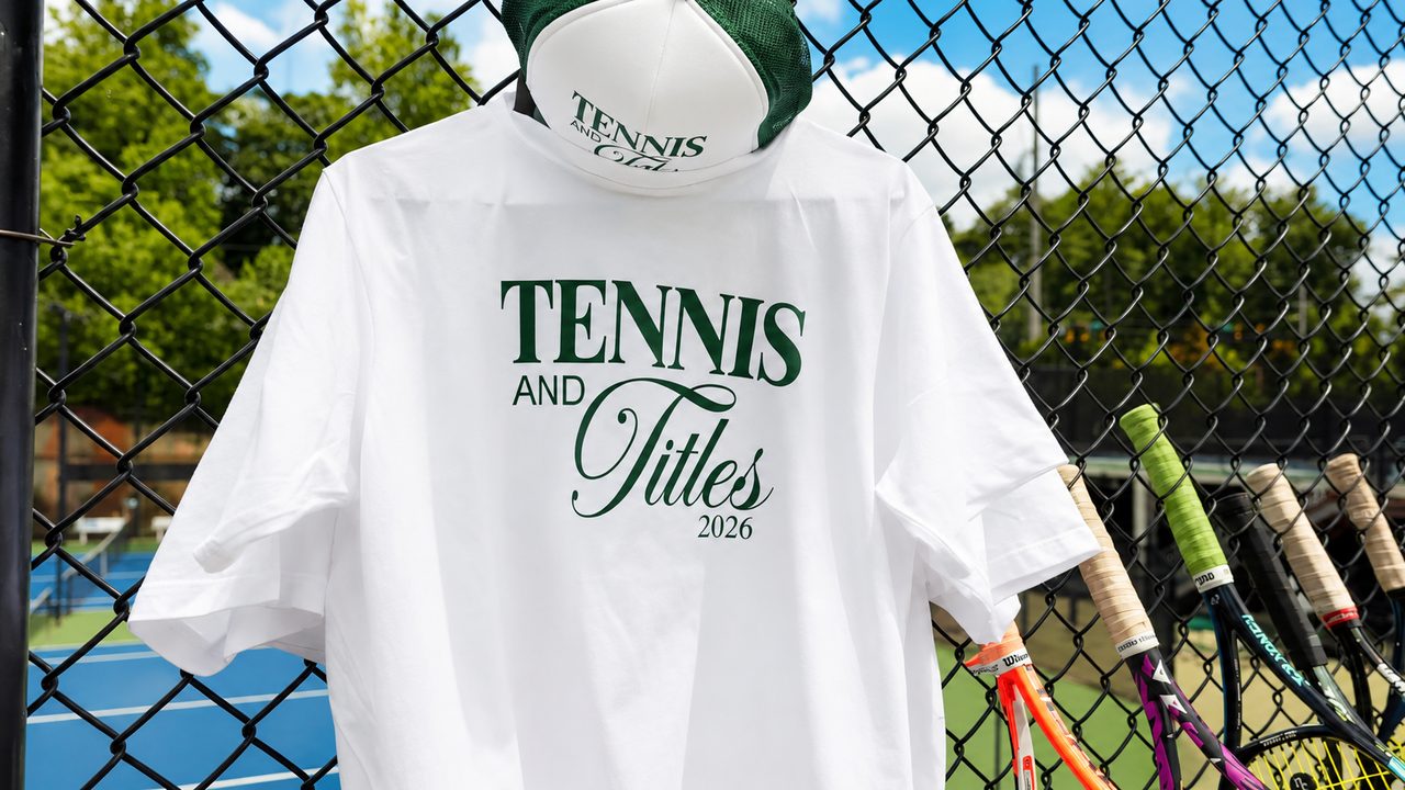 Tennis & Titles branded tee shirt on display