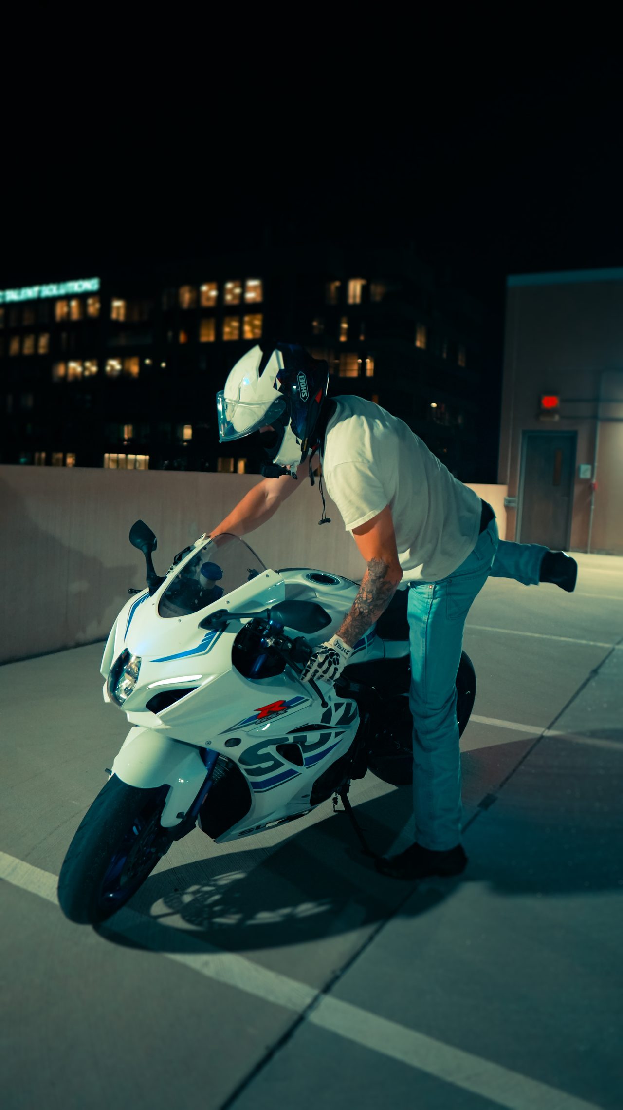 Sport bike on a parking deck at night
