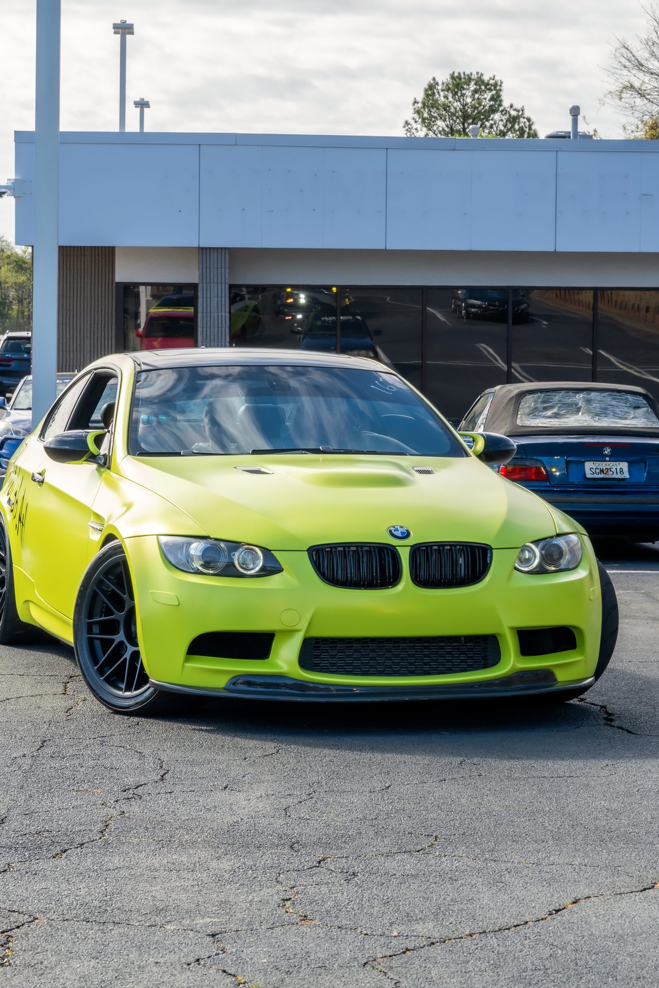 Lime green BMW M3 at a car meet